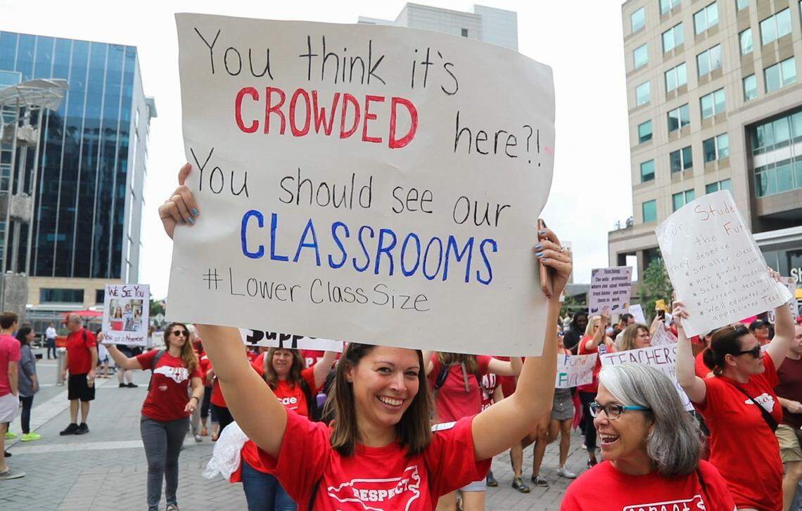 Thousands of teachers march on Fayetteville Street to the N.C. Legislative building in Raleigh, N.C. Wednesday, May 16, 2018  during the&nbsp;”March for Students and Rally for Respect,” the largest act of organized teacher political action in state history.
