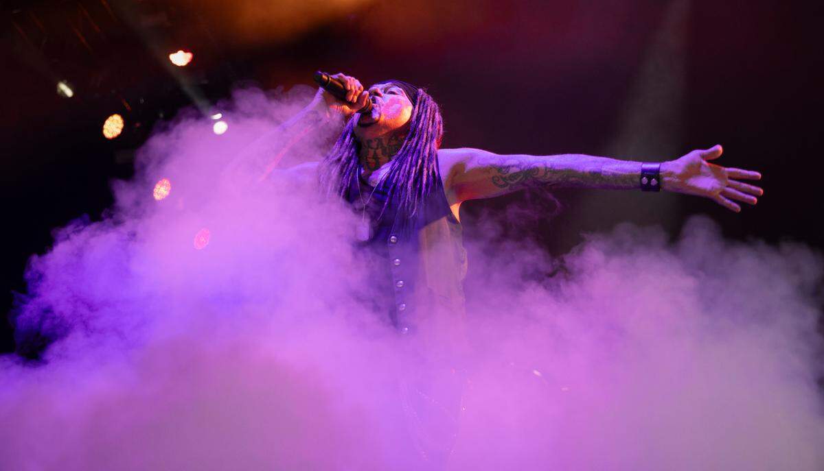 Fog surrounds Ministry lead singer Al Jourgensen as the band opens for Alice Cooper and Rob Zombie on the “Parade of Freaks Tour” in Raleigh.
