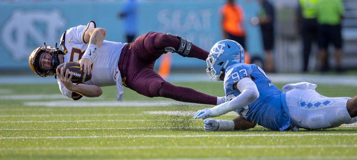 North Carolina’s Jacolbe Cowan (93) sacks Minnesota quarterback Athan Kaliakmanis (8) in the fourth quarter on Saturday, September 16, 2023 at Kenan Stadium in Chapel Hill N.C.
