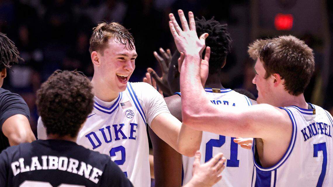 Duke’s Cooper Flagg (2) celebrates with Kon Knueppel (7) after Flagg slammed in two during the second half of Duke’s 78-57 victory over Cal at Cameron Indoor Stadium in Durham, N.C., Wednesday, Feb. 12, 2025.