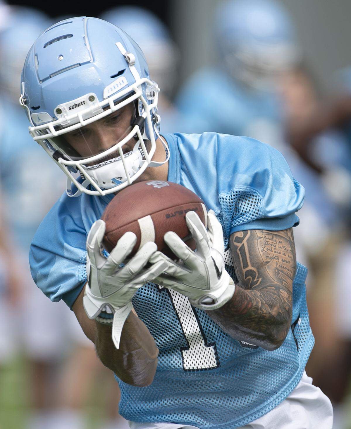 North Carolina wide receiver Beau Corrales (15) pulls in a pass reception during the Tar Heels’ first practice of the season on Friday, August 2, 2019 at the Football Practice Complex in Chapel Hill, N.C.