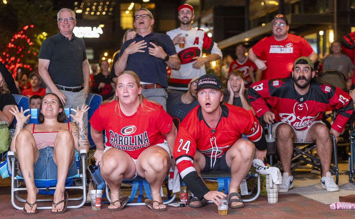 Carolina Hurricanes fans react during a Stanley Cup Final watch party in Raleigh's Smoky Hollow district on Tuesday, June 9, 2026, as the Hurricanes play the Vegas Golden Knights in Game 4 of the Stanley Cup Final.