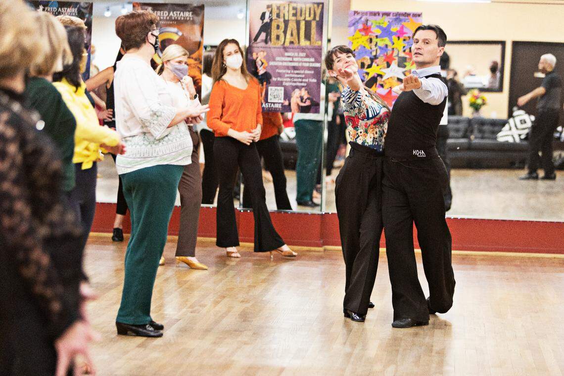 Ruslan Golovashchenko, right, the two-time Ukrainian ballroom dance champion teaches a master class at Fred Astaire Dance Studio in Durham on Tuesday, March 1, 2022. Golovashchenko is stranded in Durham while his family escapes Kyiv.