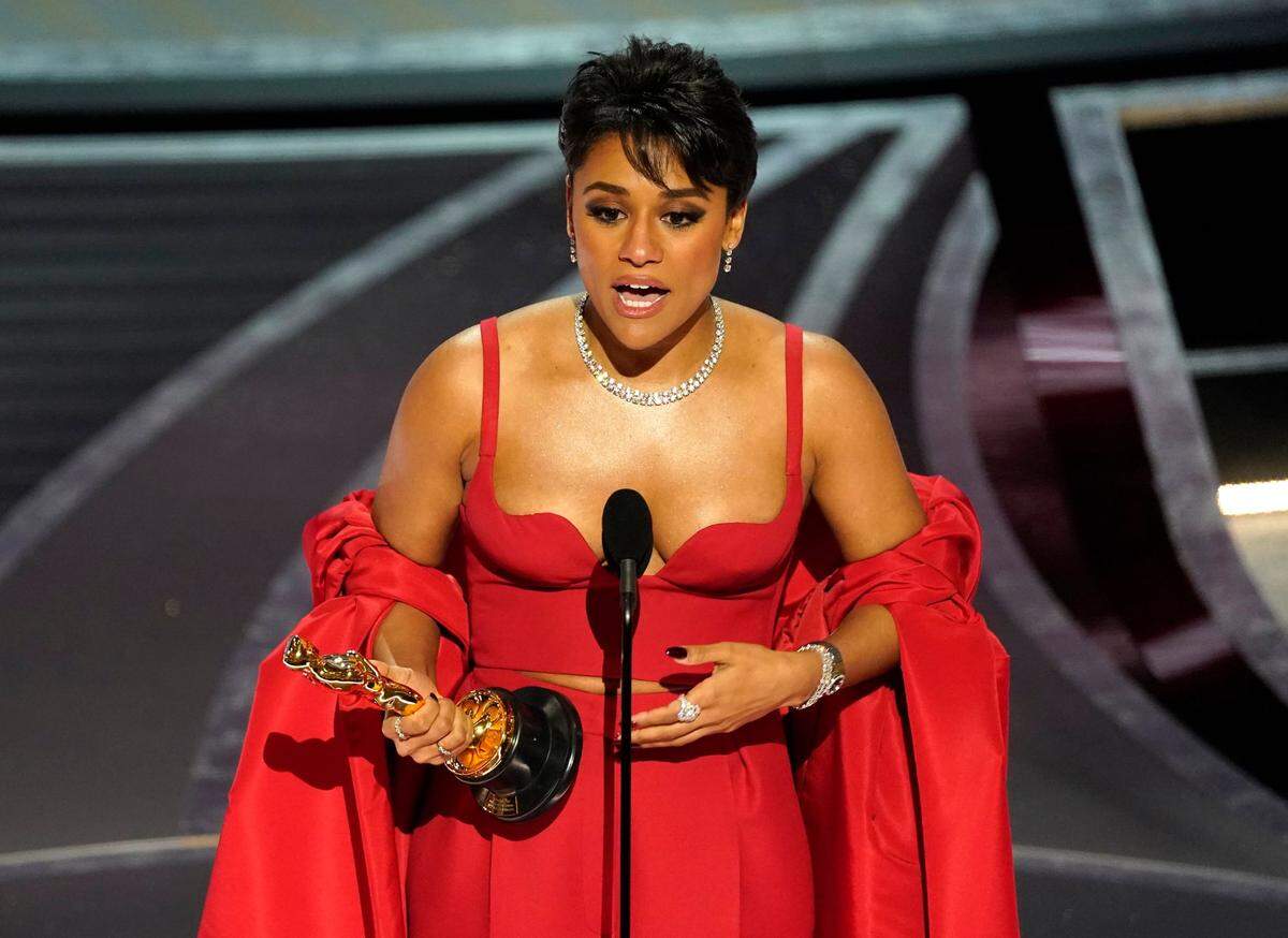 Ariana DeBose accepts the award for best performance by an actress in a supporting role for “West Side Story” at the Oscars on Sunday, March 27, 2022, at the Dolby Theatre in Los Angeles.