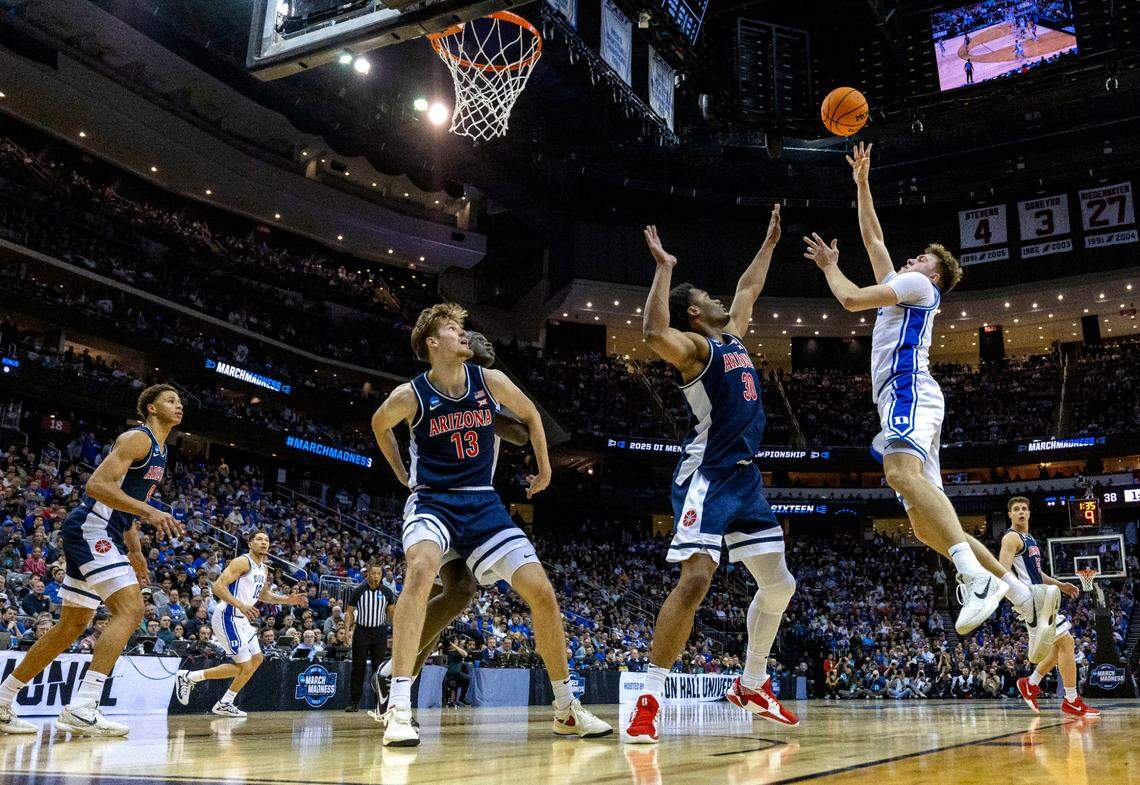 Duke forward Cooper Flagg (2) puts up a shot against Arizona’s Tobe Awaka (30) in the first half on Thursday, March 27, 2025 during the NCAA Sweet 16 at Prudential Center in Newark, NJ. Flagg scored 30 point in the Blue Devils’ 100-93 victo