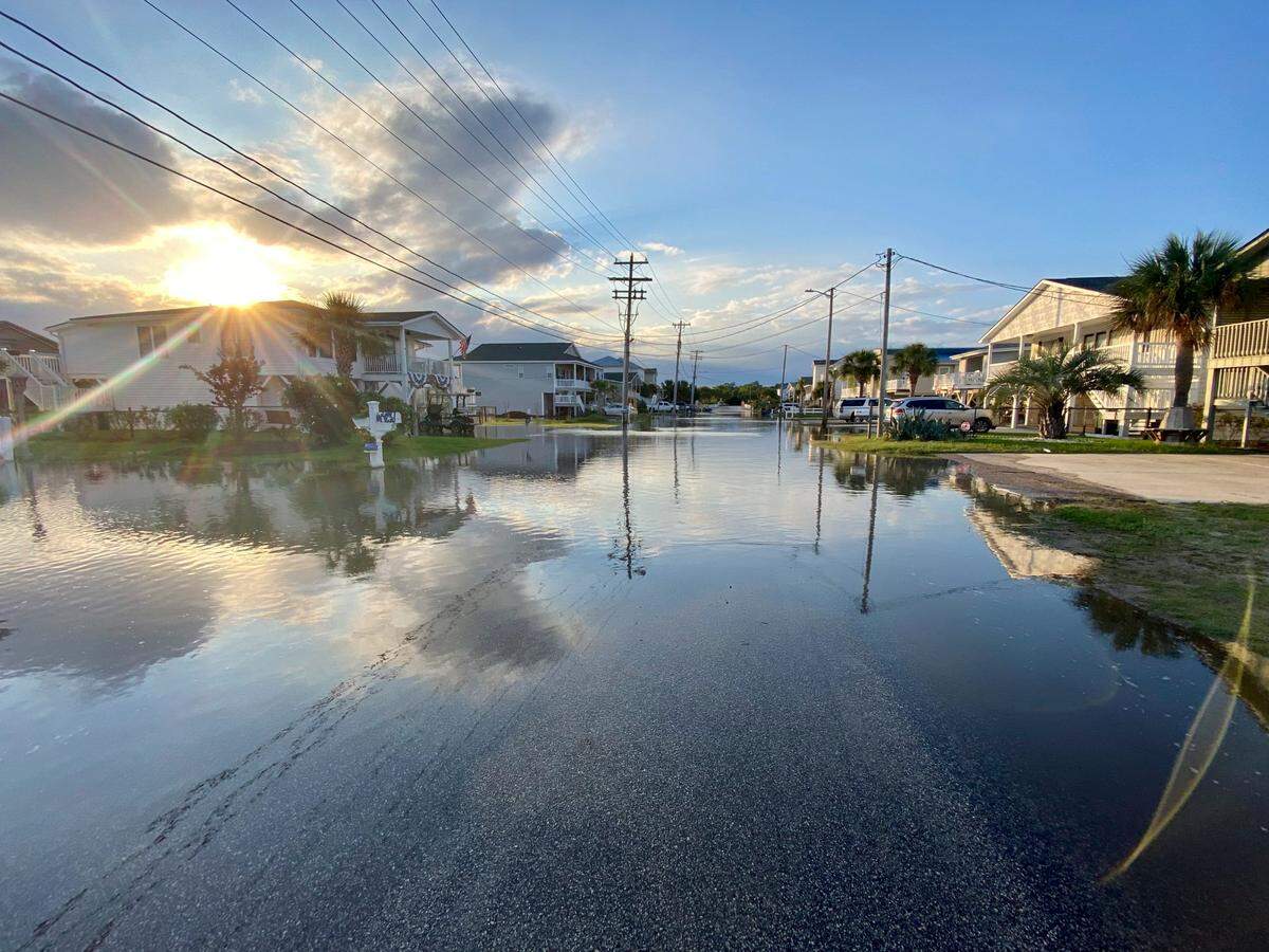 Streets flood during King Tides Cherry Grove section of North Myrtle Beach. Aug. 11, 2021.