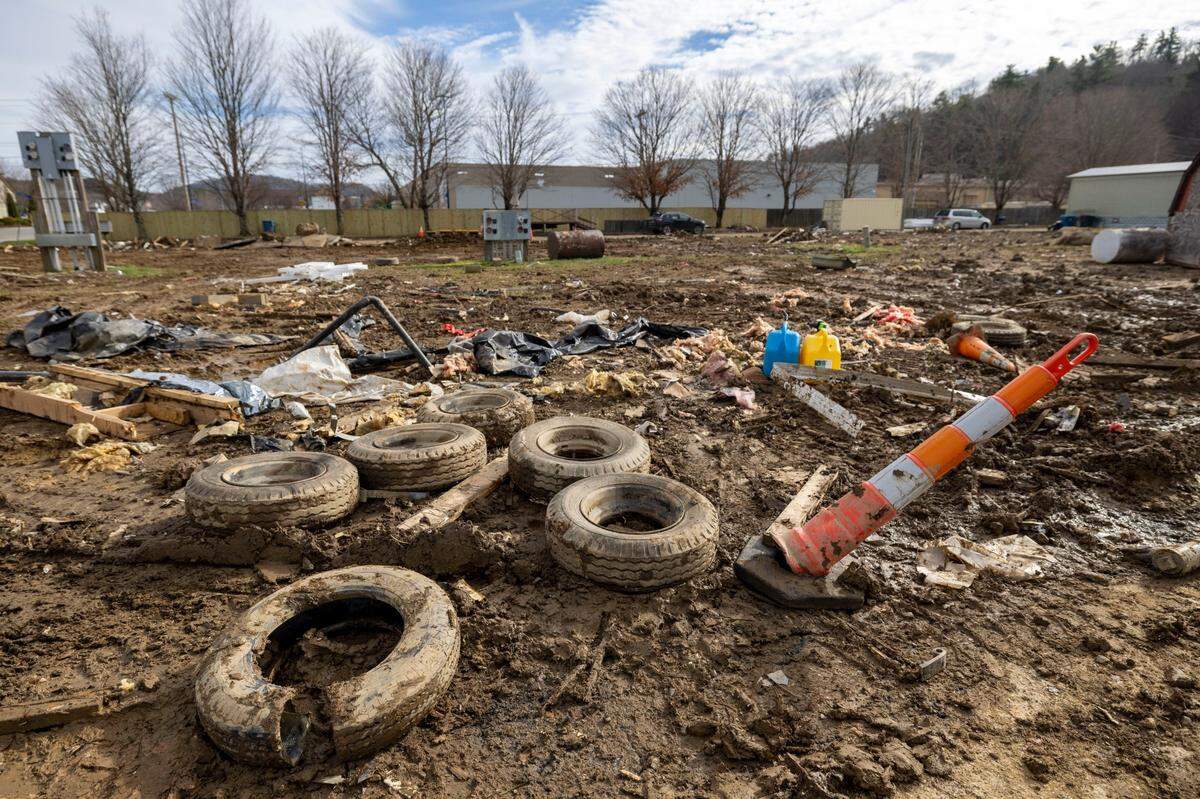 Flooding from Helene created a barren landscape of tires, mud and the remains of mobile homes in what was a community in Boone.