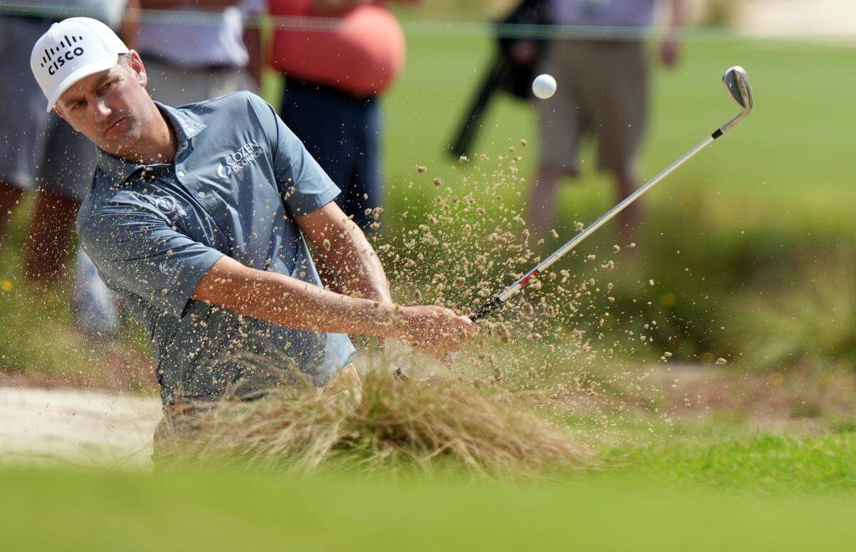 Jun 10, 2024; Pinehurst, North Carolina, USA; Brendon Todd blasts out of the sand onto the sixth green during a practice round for the U.S. Open golf tournament at Pinehurst No. 2.Katie Goodale-USA TODAY Sports