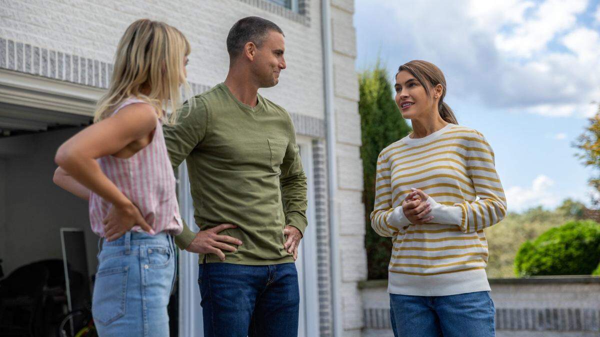 Laura Ramsey, Colin Egglesfield and Chrishell Stause in “A Rose for Her Grave: The Randy Roth Story” premiering Saturday, February 18 on Lifetime.