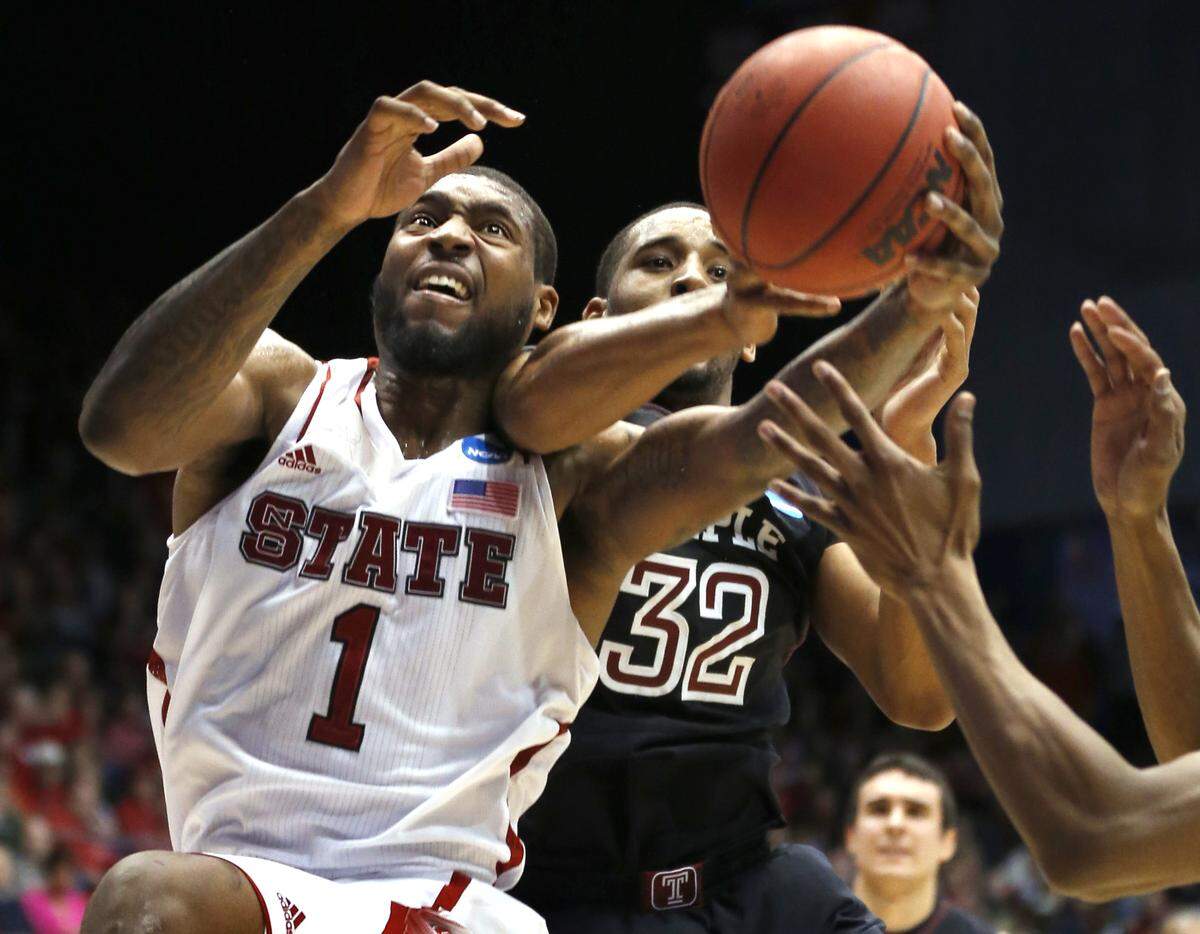N.C. State’s Richard Howell (1) fights for a rebound with Temple’s Rahlir Hollis-Jefferson (32) in first half of N.C. State’s game against Temple in the second round of the NCAA Tournament Friday, March 22 2013, at the University of Dayton Arena in Dayton, Ohio.