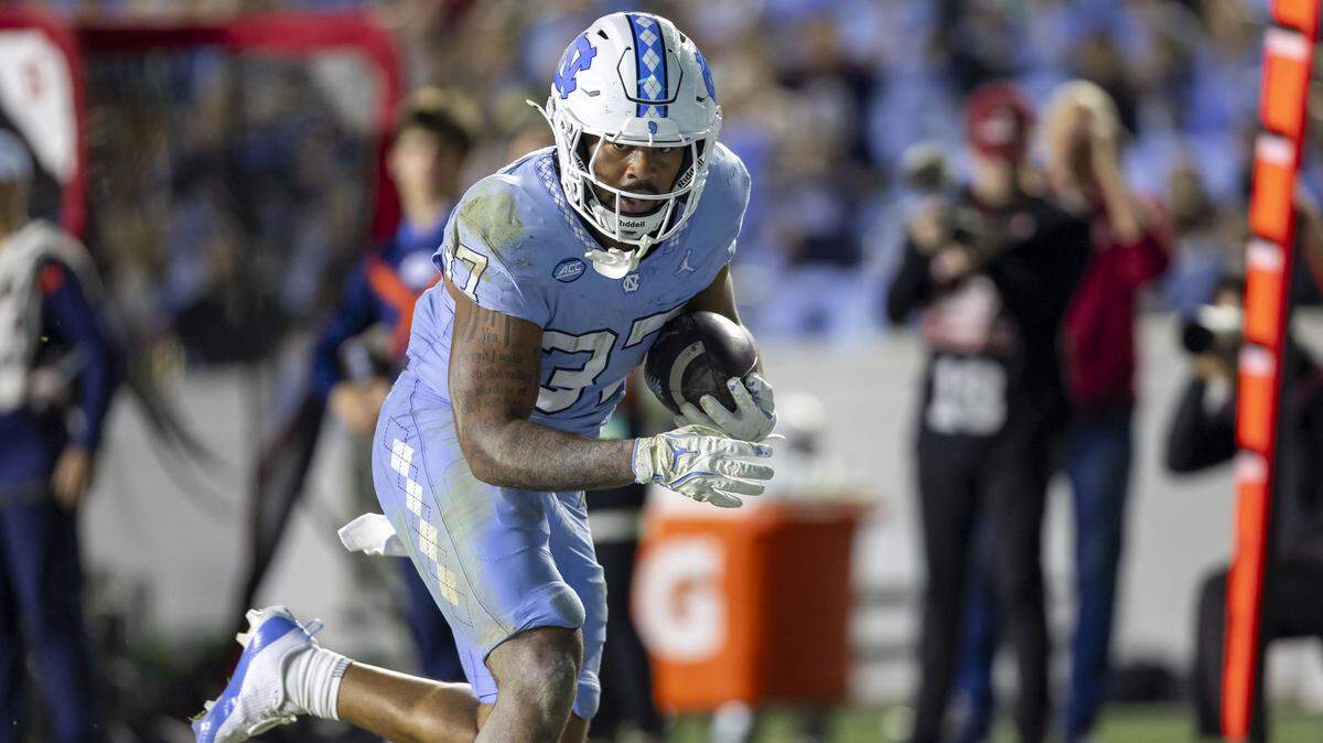 North Carolina running back Davion Gause (37) scores on a 20 yard pass reception from quarterback Gio Lopez (7) in the third quarter to take a 10-3 lead over Stanford on Saturday, November 8, 2025 at Kenan Stadium in Chapel Hill, N.C.