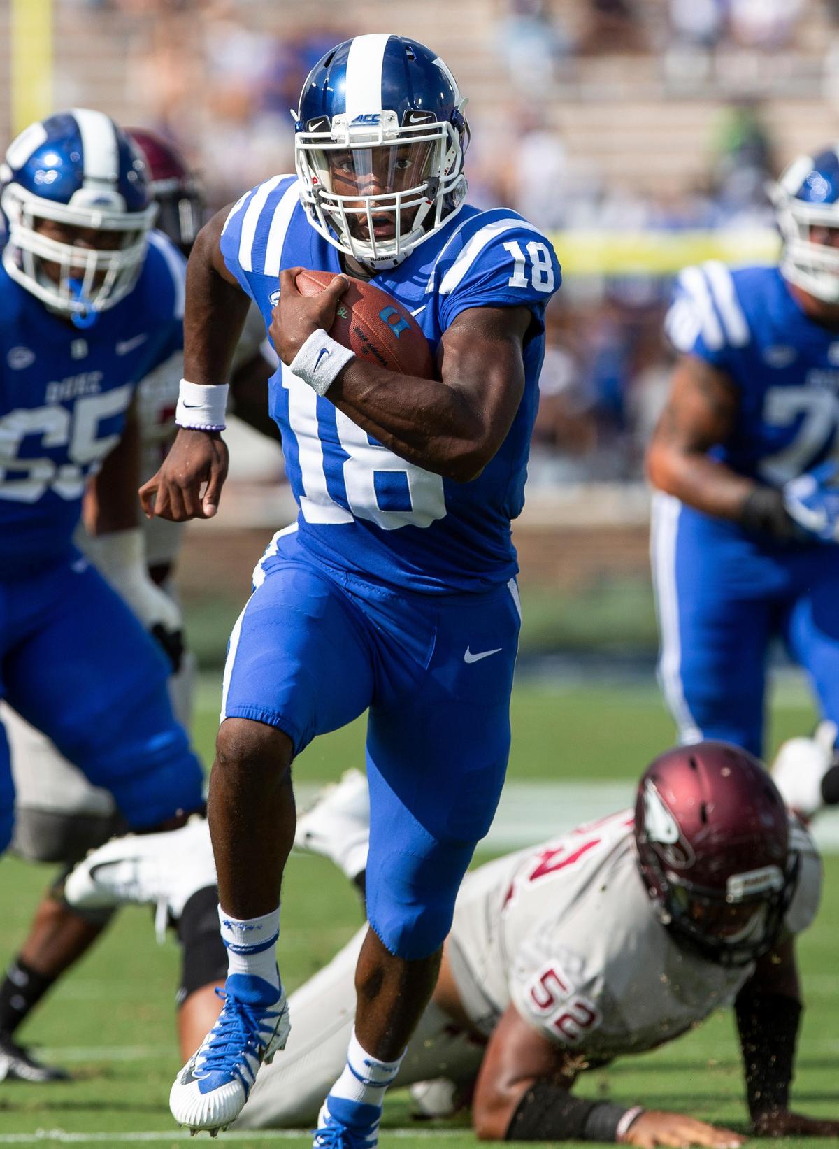 Duke quarterback Quentin Harris (18) carries the ball for a touchdown during the first half of an NCAA college football game against North Carolina Central in Durham, N.C., Saturday, Sept. 22, 2018. (AP Photo/Ben McKeown)