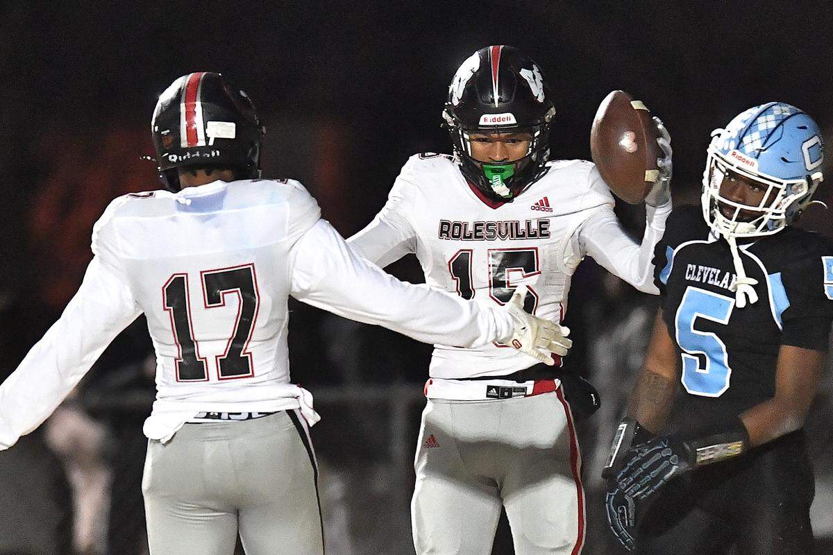 Rolesville’s Jaedon Alford (17) celebrates Anthony Roberts’ (15) touchdown against Cleveland in the first half. The Rolesville Rams and the Cleveland Rams met in the fourth round of the NCHSAA 4A football playoffs in Clayton, N.C. on December 6, 2024.