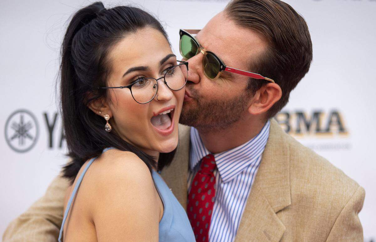 Daniel Mullins and Santana Mullins pose on the red carpet as they arrive for the IBMA Bluegrass Music Awards at Duke Energy Center on Thursday, September 29, 2021 in Raleigh, N.C.