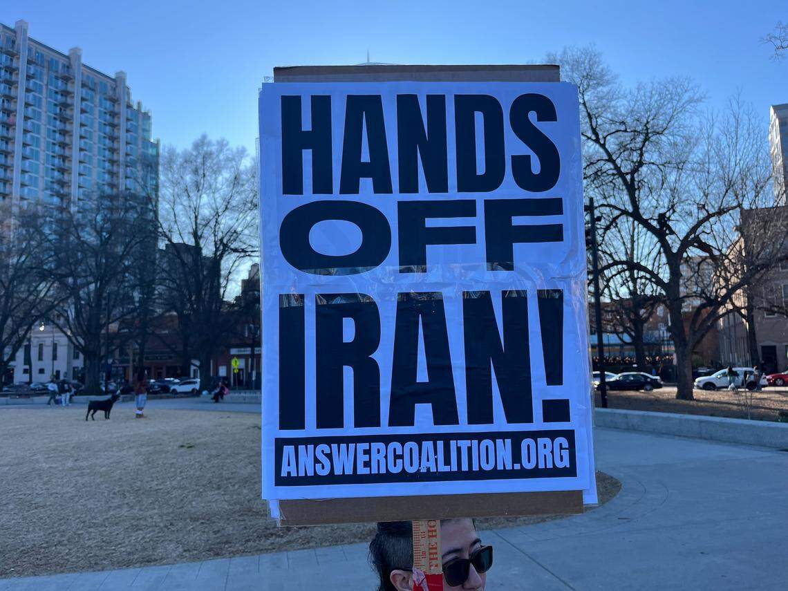 Protesters gathered at Moore Square in downtown Raleigh Saturday, hours after President Donald Trump announced that the U.S. and Israel had attack Iran.