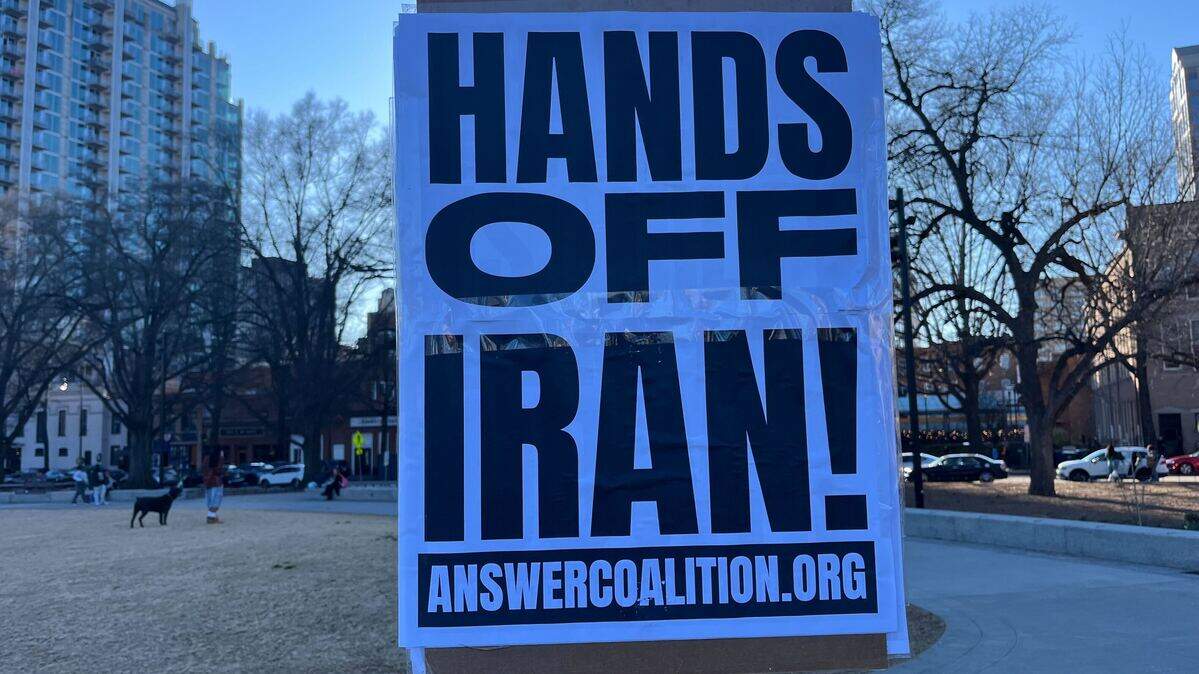 Protesters gathered at Moore Square in downtown Raleigh Saturday, hours after President Donald Trump announced that the U.S. and Israel had attacked Iran.