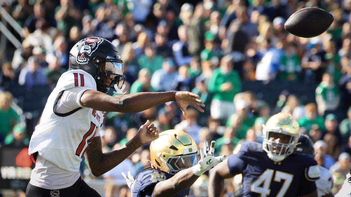 NC State’s CJ Bailey #11 throws a pass in the first quarter against the Notre Dame Fighting Irish, October 11, 2025 in South Bend, Indiana. (Photo by Justin Casterline/Getty Images)