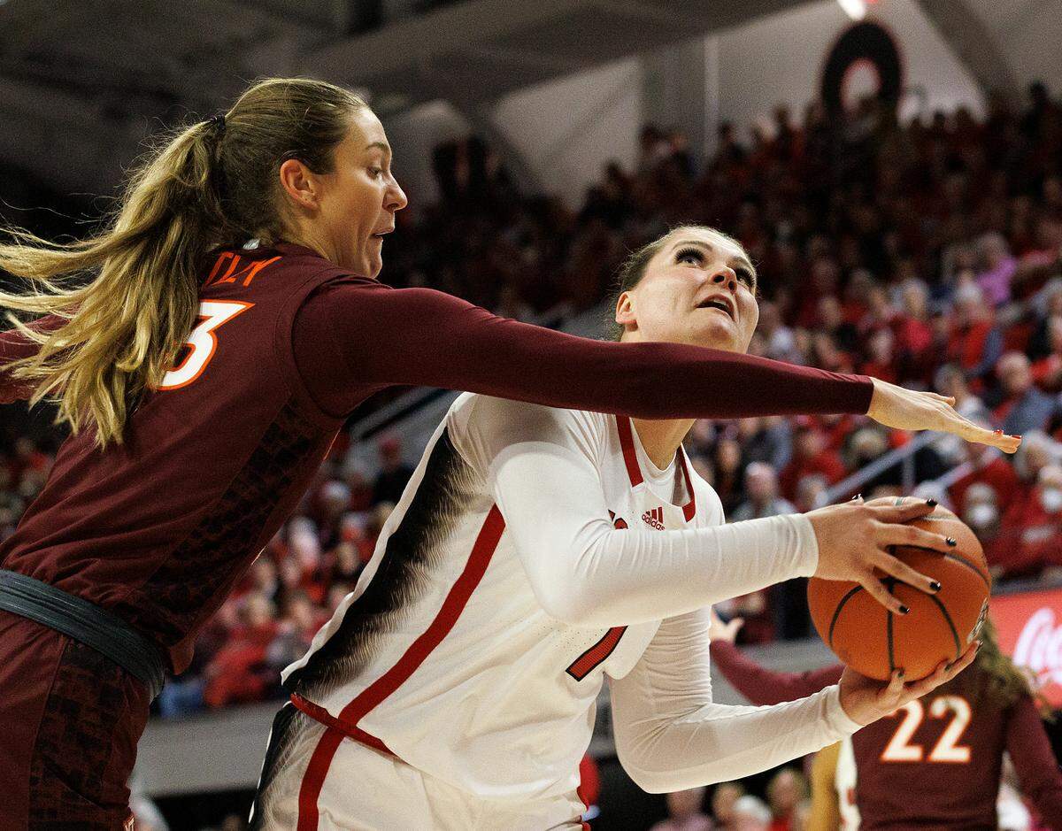 N.C. State’s River Baldwin looks to shoot over Virginia Tech’s Elizabeth Kitley during the first half of the Wolfpack’s 72-61 loss on Thursday, Feb. 8, 2024, at Reynolds Coliseum in Raleigh, N.C.