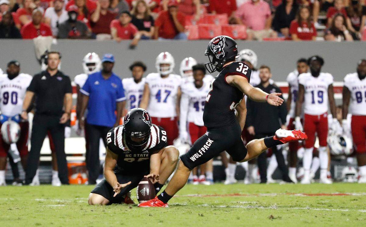 N.C. States Christopher Dunn (32) prepares to kick a 29-yard field goal during the first half of N.C. States game against Louisiana Tech at Carter-Finley Stadium in Raleigh, N.C., Saturday, October 2, 2021.