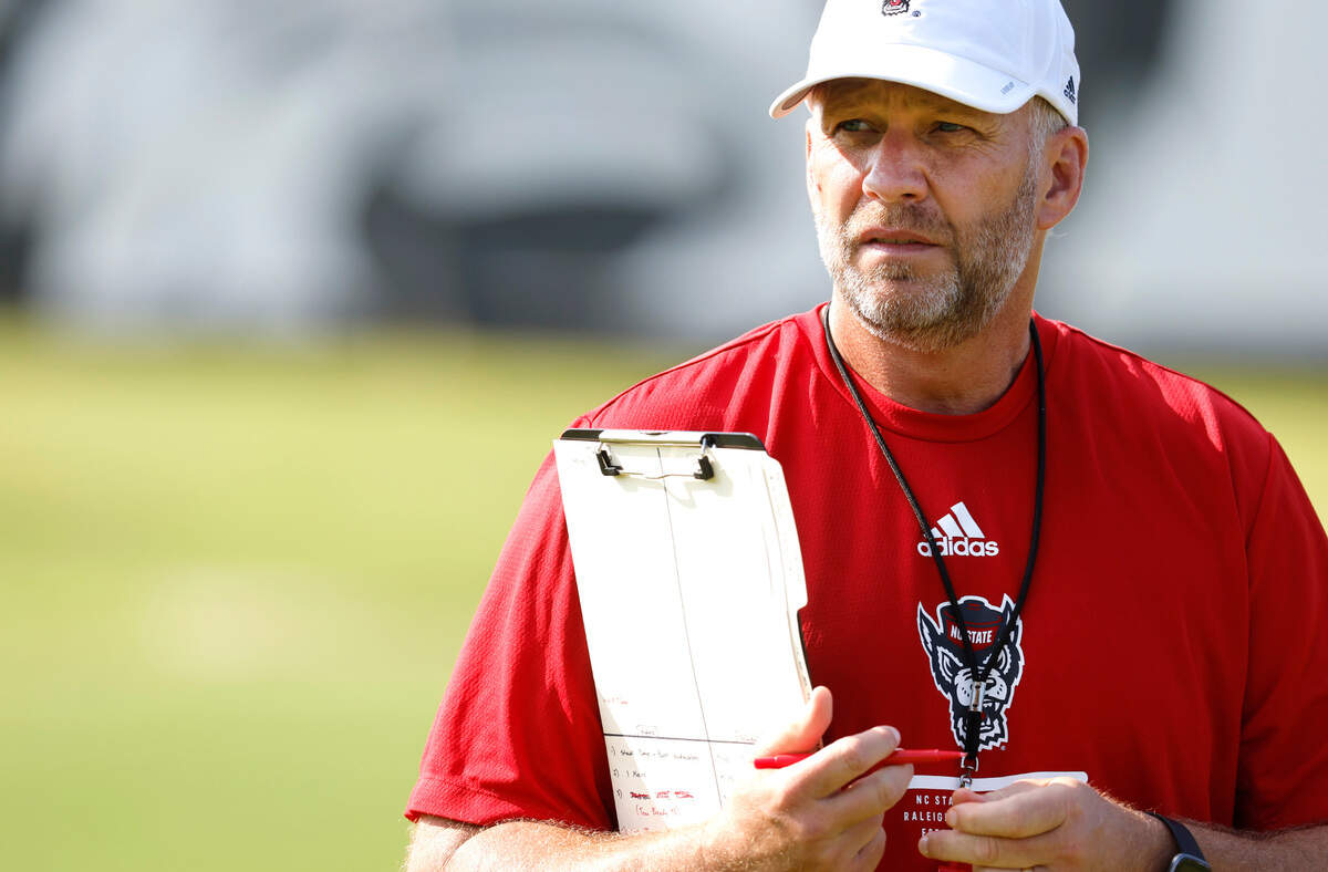 N.C. State head coach Dave Doeren watches during the Wolfpack’s first practice of fall camp in Raleigh, N.C., Wednesday, August 3, 2022.