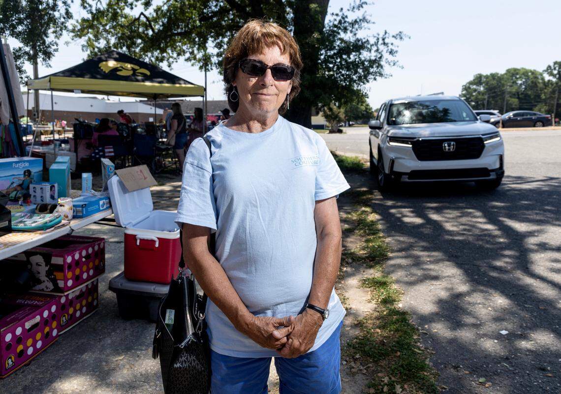 Terry Benhoff poses for a portrait in Selma, N.C. while shopping at the 301 Endless Yard Sale Friday, June 14, 2024.