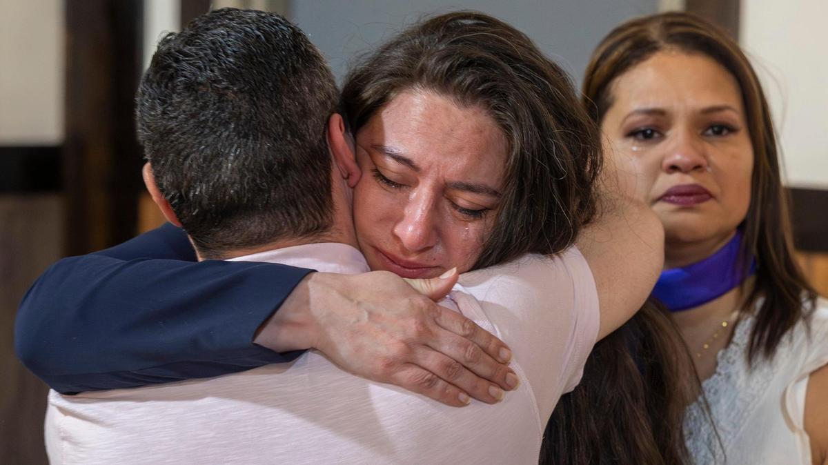 Cristina España, deputy director for diversity equality and inclusion, from Governor Roy Cooper’s staff, embraces Mauricio Pérez Concha, whose sister was killed this year by her ex-boyfriend, following their remarks at El Centro Hispano on Friday, March 8, 2024 in Raleigh, N.C. The gathering on International Women’s Day, was to raise awareness to the increase in femicide in North Carolina.