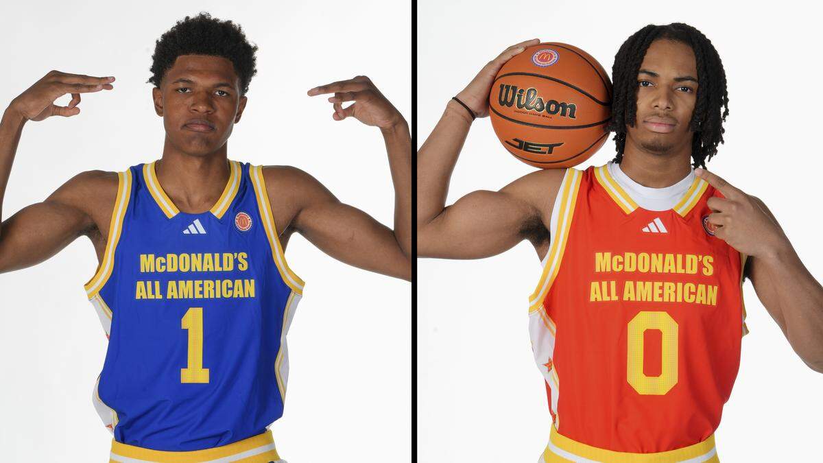 Duke recruits Cameron Williams, left, and Deron Rippey Jr. pose for photos for the McDonald's All American Games.