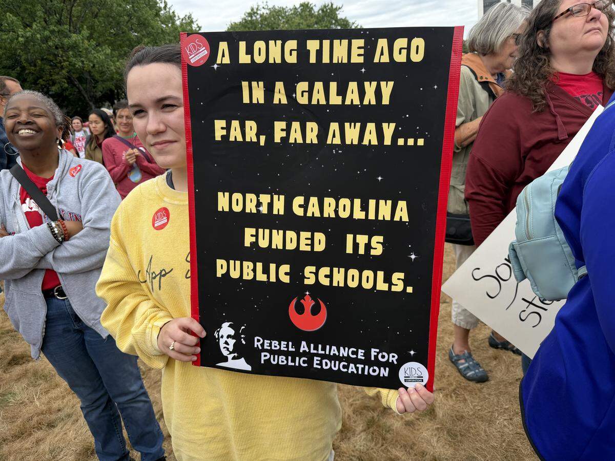 One of many creative signs at the rally for teachers in Raleigh.