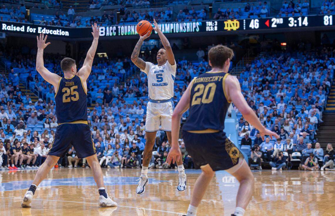 North Carolina’s Armando Bacot (5) launches the second of his three-point shots in the second half against Notre Dame. Bacot scored 14 points in the Tar Heels’ 84-51 victory over Noter Dame, in his final home game on Tuesday, March 5, 2023 at the Smith Center in Chapel Hill, N.C.