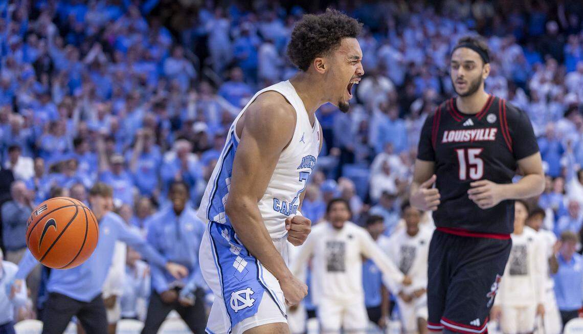 North Carolina guard Seth Trimble (7) reacts after a break away dunk in the second half against Louisville on Monday, February 23, 2026 at the Smith Center in Chapel Hill, N.C. Trimble led all scores with 30 points in the Tar Heels’ 77-74 victory.