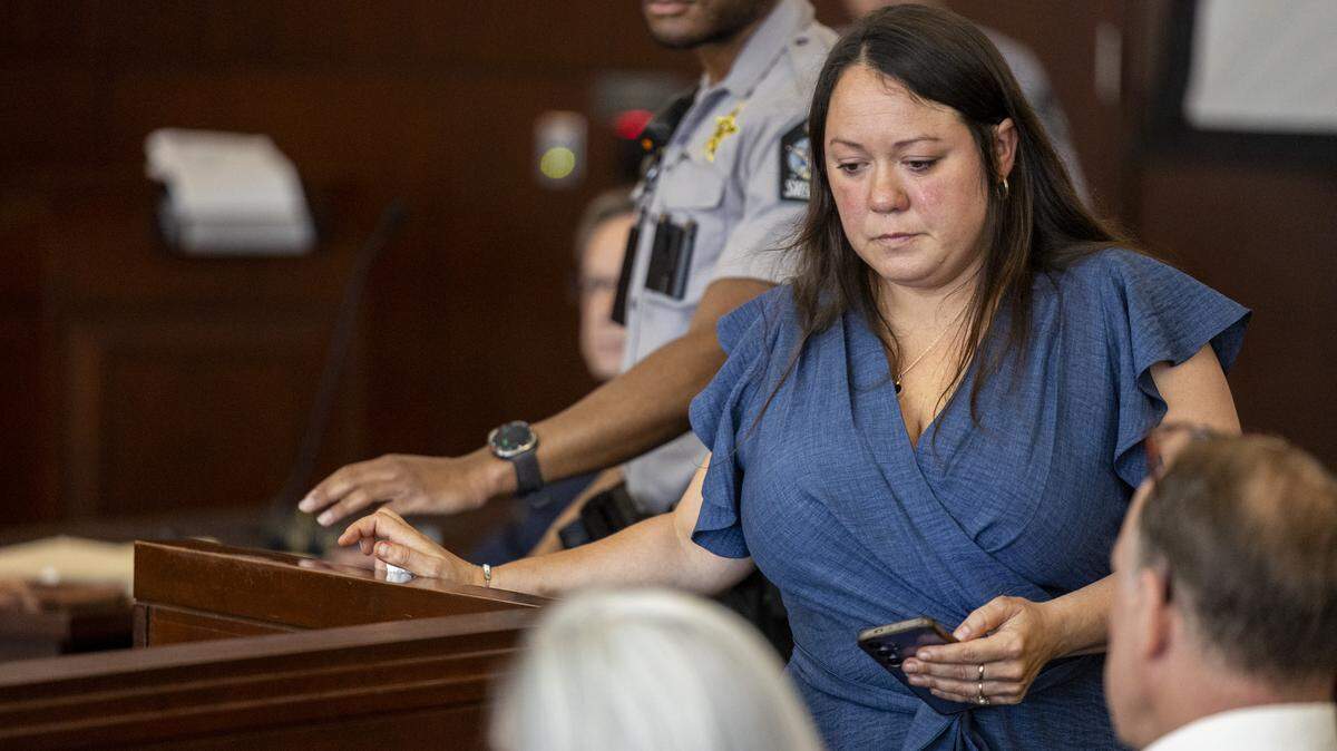 Katey Millette, sister of David Millette Jr., returns to a seat in the courtroom after delivering a victim impact statement during the sentencing hearing for Tyrell Moore on Monday, June 1, 2026, at the Wake County Justice Center in Raleigh. Moore pleaded guilty earlier this year to voluntary manslaughter in the death of David Millette Jr., who died after Moore struck him during a confrontation in Raleigh's Glenwood South district in August 2023.