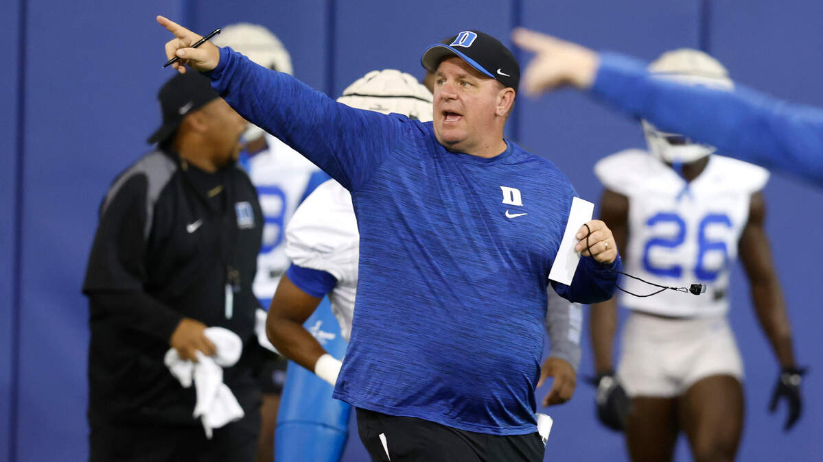 Duke head coach Mike Elko instructs his team during the Blue Devils’ first practice of fall camp in Durham. N.C. Tuesday, August 2, 2022.