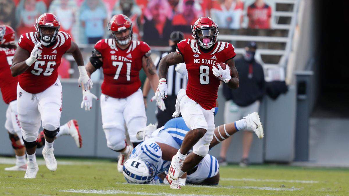 N.C. State running back Ricky Person Jr. (8) gains yards during the first half of N.C. State’s game against Duke at Carter-Finley Stadium in Raleigh, N.C., Saturday, Oct. 17, 2020.