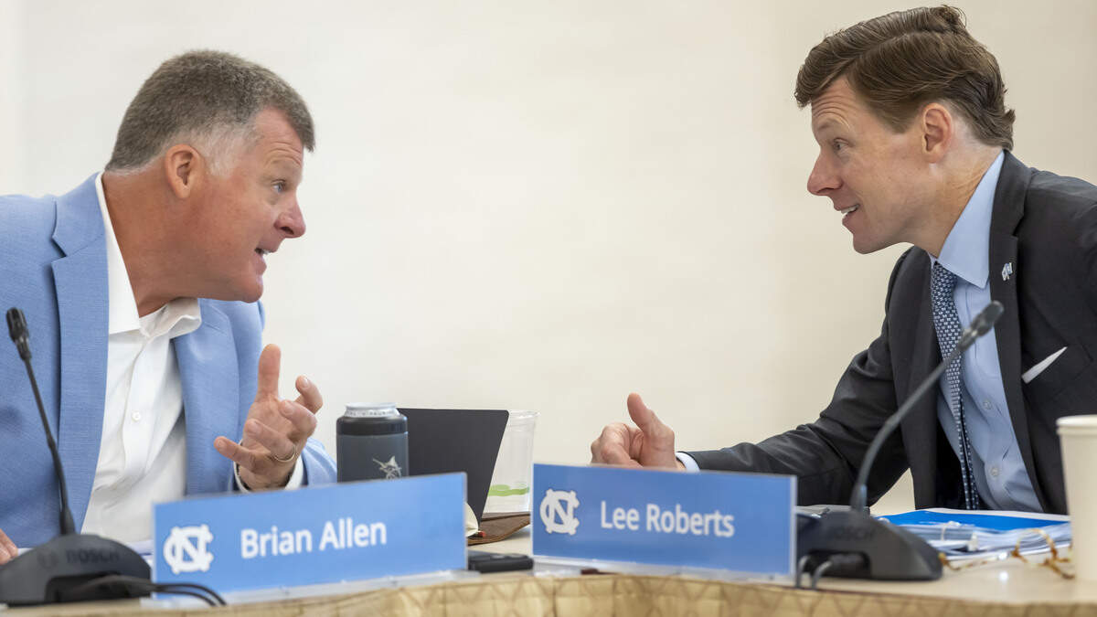 University of North Carolina Board of Trustees member Brian Allen, left, confers with Chancellor Lee Roberts during their meeting on Wednesday, July 29, 2026 at the Rizzo Center in Chapel Hill, N.C.