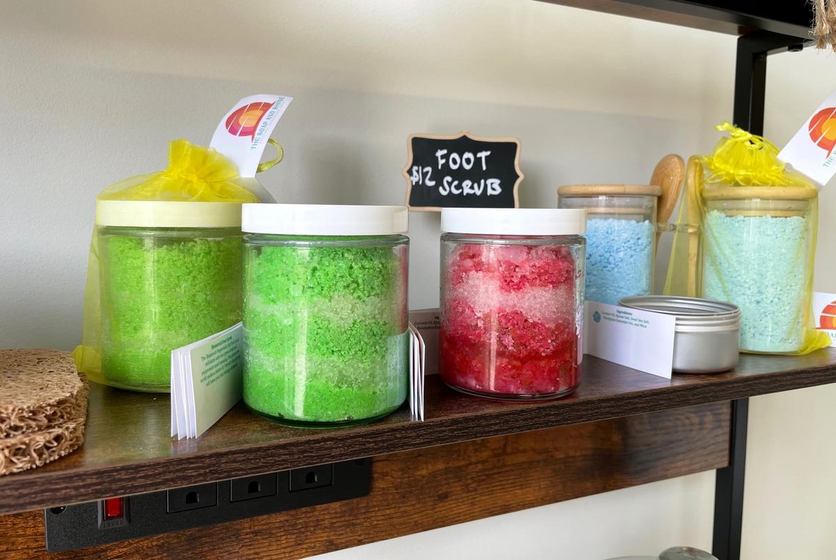 Brianna Cherner handcrafts the soaps, candles, lotions and other bath products, like these foot scrubs, in her University Place store, The Soap and Shine. She also teaches classes for children and adults and will hold camps this summer.
