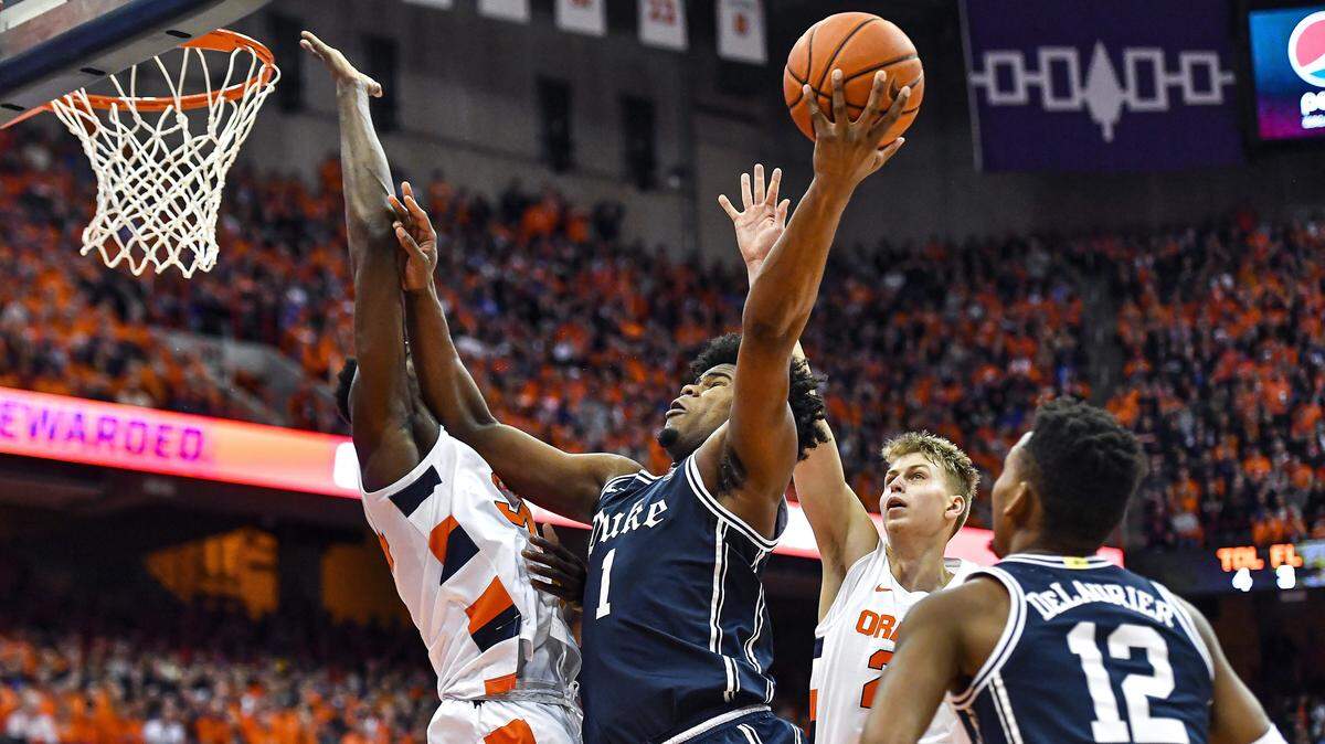 Duke center Vernon Carey Jr. (1) drives to the basket against Syracuse forward Bourama Sidibe, left, during the first half of an NCAA college basketball game in Syracuse, N.Y., Saturday, Feb. 1, 2020.