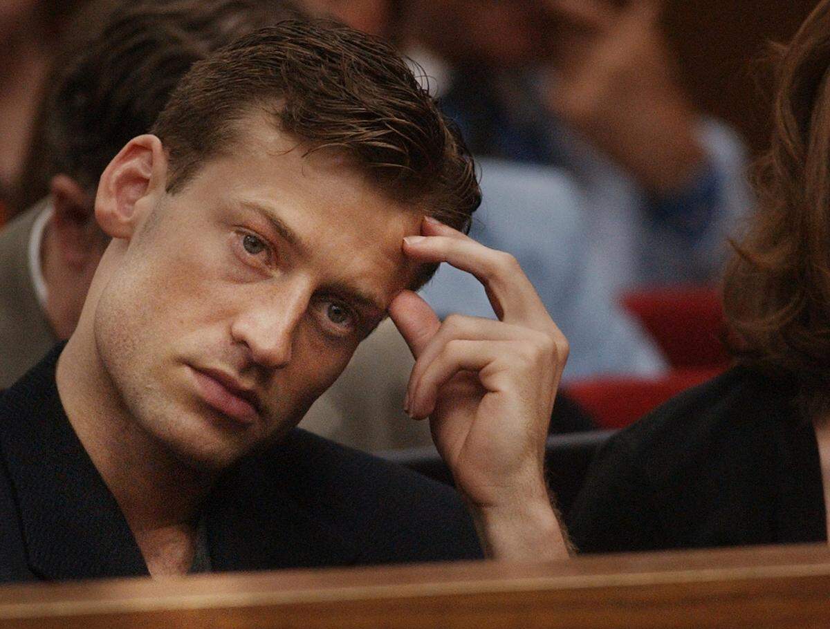 Todd Peterson listens as former Durham police officer James McVay describes his attitude the night his stepmother was found dead in the Peterson home during testimony Friday in his father Michael Peterson’s murder trial.