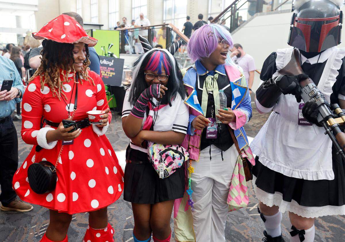 From left, Javan Bennett, dressed as “Kinoko Komori,” Kylie Reese, dressed as “Ibuki Mioda,” Raine Jones dressed as “Rui Kamishiro,” and Avery Adams, dressed as “The Maidolorian,” talk while having their photo taken during GalaxyCon Raleigh at the Raleigh Convention Center Sunday, July 30, 2023.