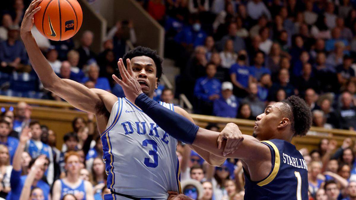 Duke’s Jeremy Roach (3) pulls in the rebound from Notre Dame’s J.J. Starling (1) during the second half of Duke’s 68-64 victory over Notre Dame at Cameron Indoor Stadium in Durham, N.C., Tuesday, Feb. 14, 2023.