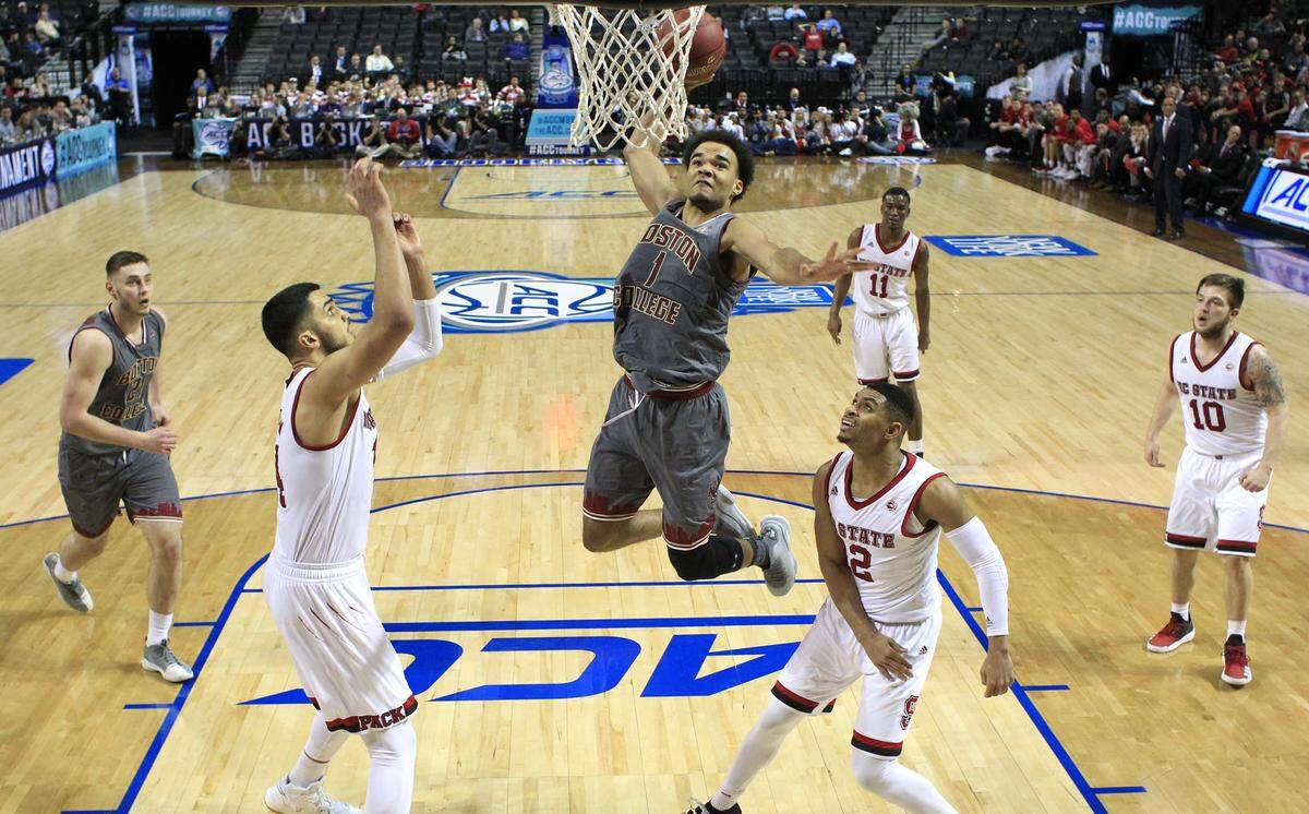 Boston College's Jerome Robinson (1) heads to slam in two during Boston College's 91-87 victory over N.C. State in the second round of the 2018 ACC tournament. Robinson, who is from Garner and went to Broughton High, has signed with an agent and has decided to skip his senior season.