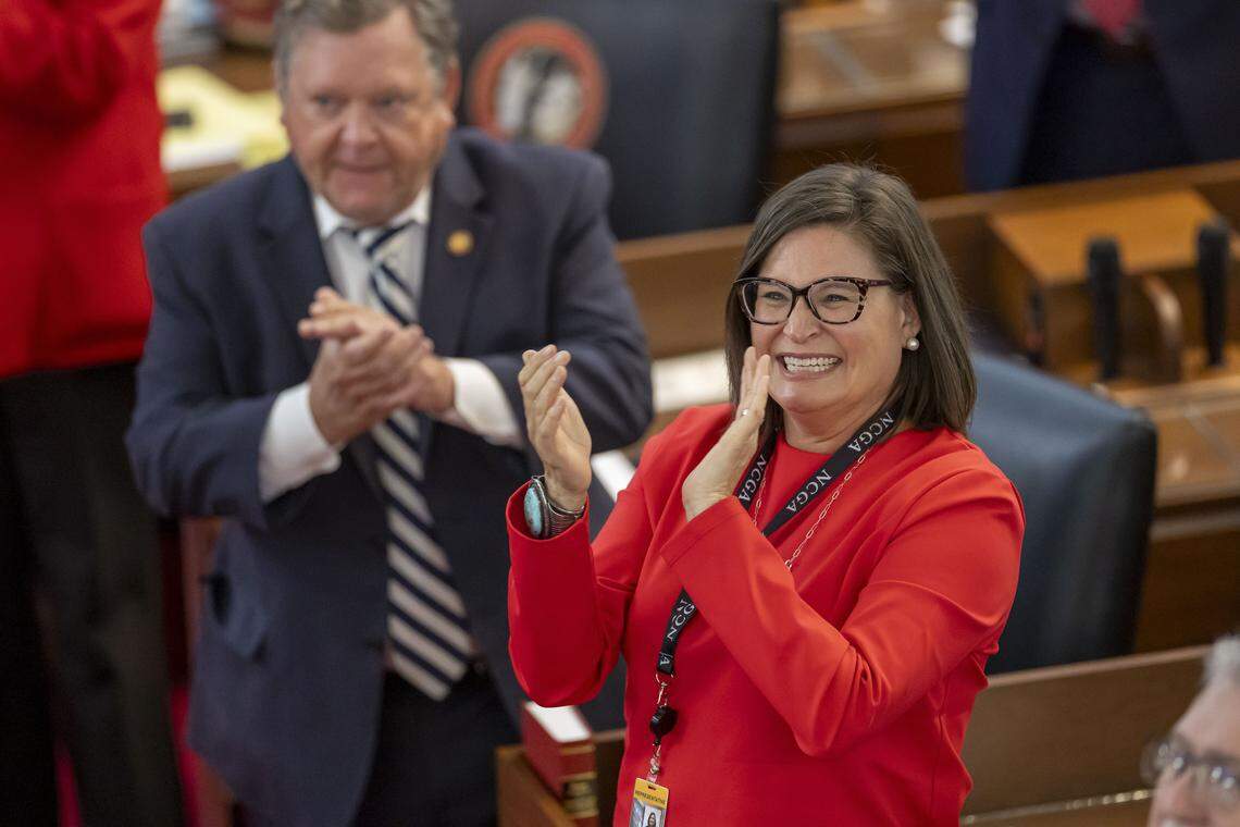Rep. Anna Ferguson, who represents Jackson, Swain and Transylvania counties, applauds a delegation of Cherokee Tribe members in the gallery, after she was seated in the House of Representatives on Tuesday, April 21, 2026 in Raleigh, N.C.