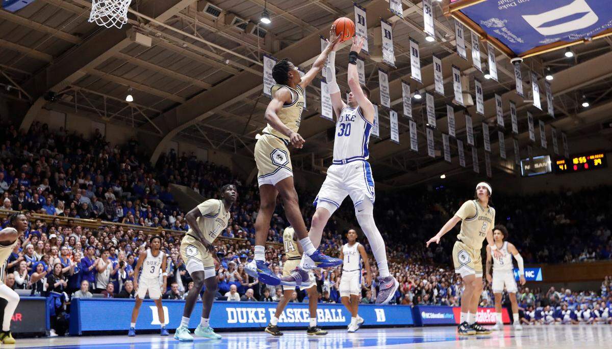 Georgia Tech’s Tafara Gapare (5) blocks the shot by Duke’s Kyle Filipowski (30) during Duke’s 84-79 victory over Georgia Tech at Cameron Indoor Stadium in Durham, N.C., Saturday, Jan. 13, 2024.