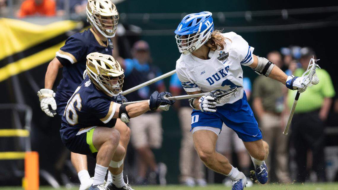 Duke Blue Devils midfielder Garrett Leadmon (1) controls the ball against Notre Dame Fighting Irish Maxim Manyak (16) during Sunday’s second quarter at Lincoln Financial. Bill Streicher-USA TODAY Sports
