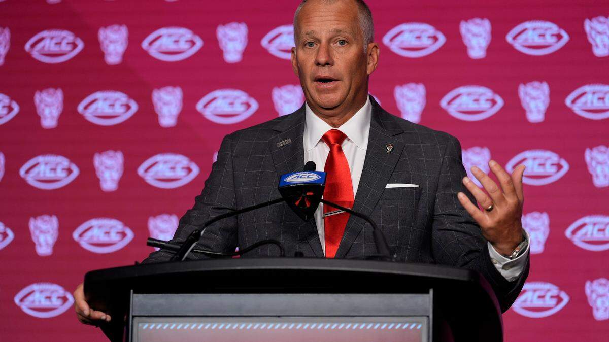 North Carolina State Wolfpack head coach Dave Doeren talks with the media during the ACC Kickoff at Hilton Charlotte Uptown. 