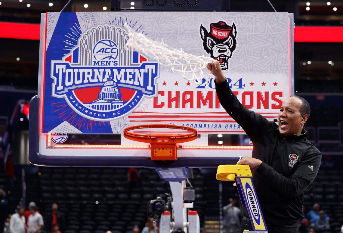 N.C. State’s head coach Kevin Keatts celebrates after cutting down the net after N.C. State’s 84-76 victory over UNC in the championship game of the 2024 ACC Men’s Basketball Tournament at Capital One Arena in Washington, D.C., Saturday, March 16, 2024.