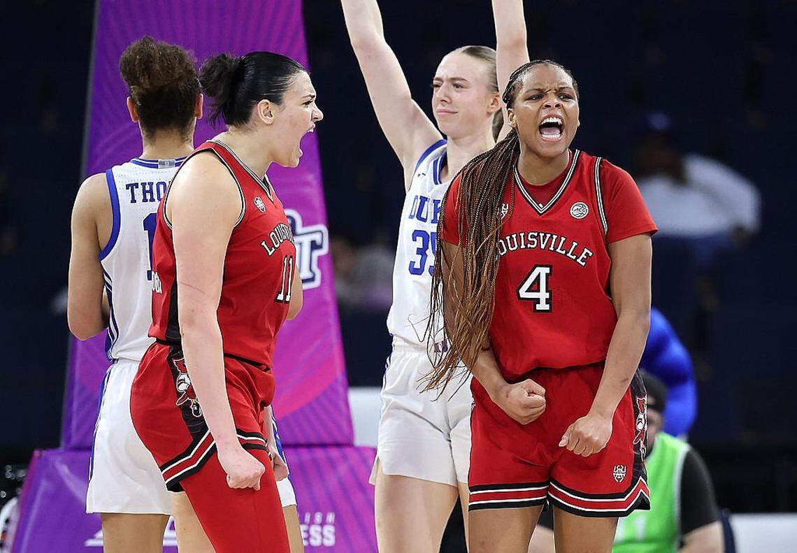 MacKenly Randolph (4) of the Louisville Cardinals reacts with Elif Istanbulluoglu (11) after drawing a foul on a basket against Toby Fournier (35) of the Duke Blue Devils during the second quarter of the Women's ACC Championship at Gas South Arena on March 8, 2026 in Duluth, Georgia.
