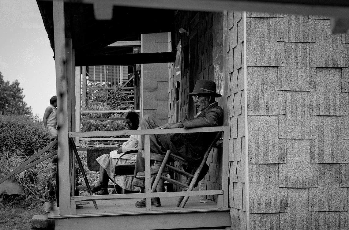 Fourth Ward/Southside residents sit on porches, January 22, 1970.