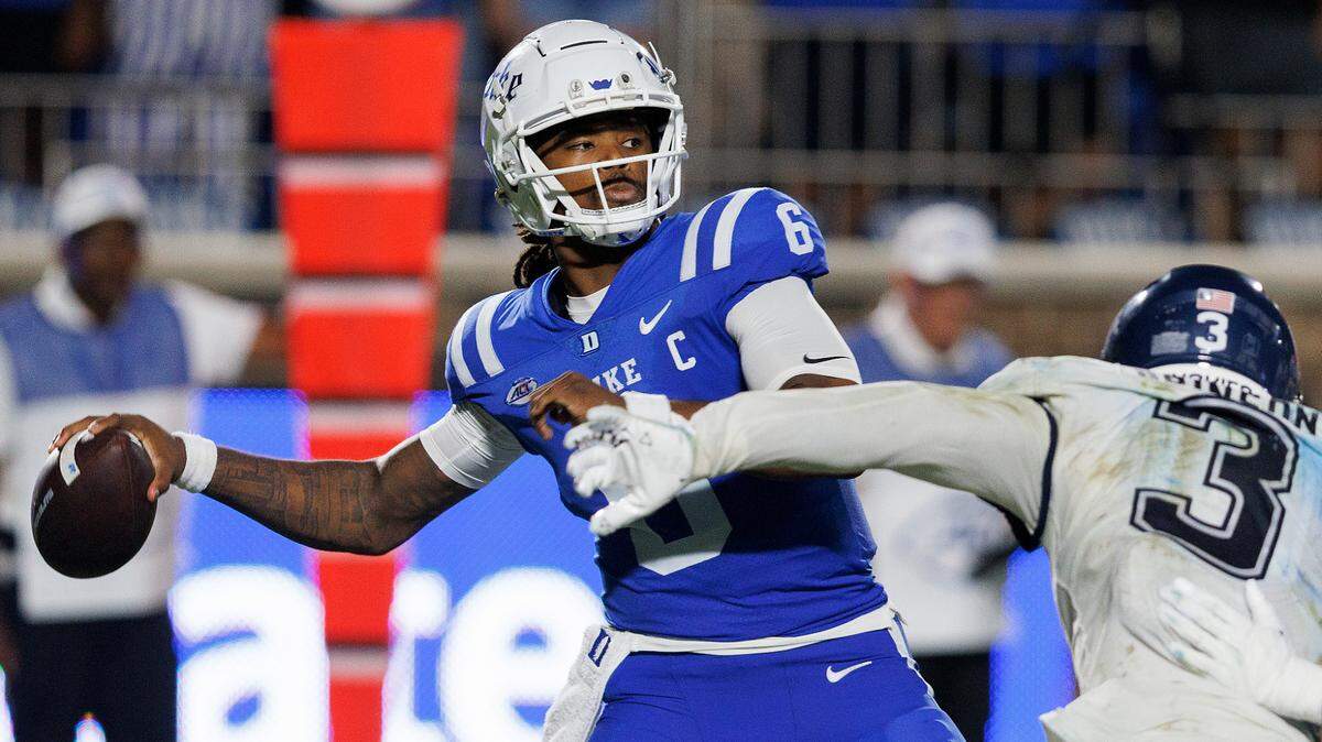 Duke quarterback Maalik Murphy looks to pass over Connecticut’s D’Mon Brinson during the second half of the Blue Devils’ 26-21 win on Saturday, Sept. 14, 2024, at Wallace Wade Stadium in Durham, N.C.