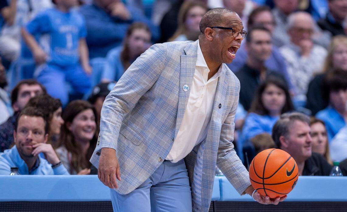 North Carolina coach Hubert Davis reacts to a turnover by his team during the first half against N.C. State on Saturday, March 2, 2023 at the Smith Center in Chapel Hill, N.C.