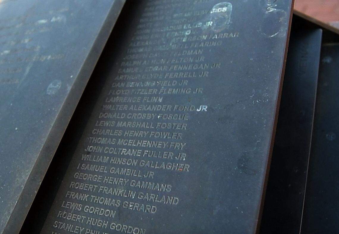 Alumni War Memorial at UNC, along the sidewalk between Phillips Hall and Memorial Hall on the UNC-Chapel Hill campus.